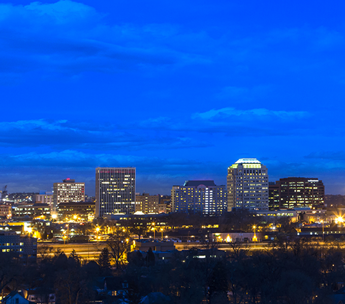 downtown skyline of Colorado Springs, Colorado, at night.